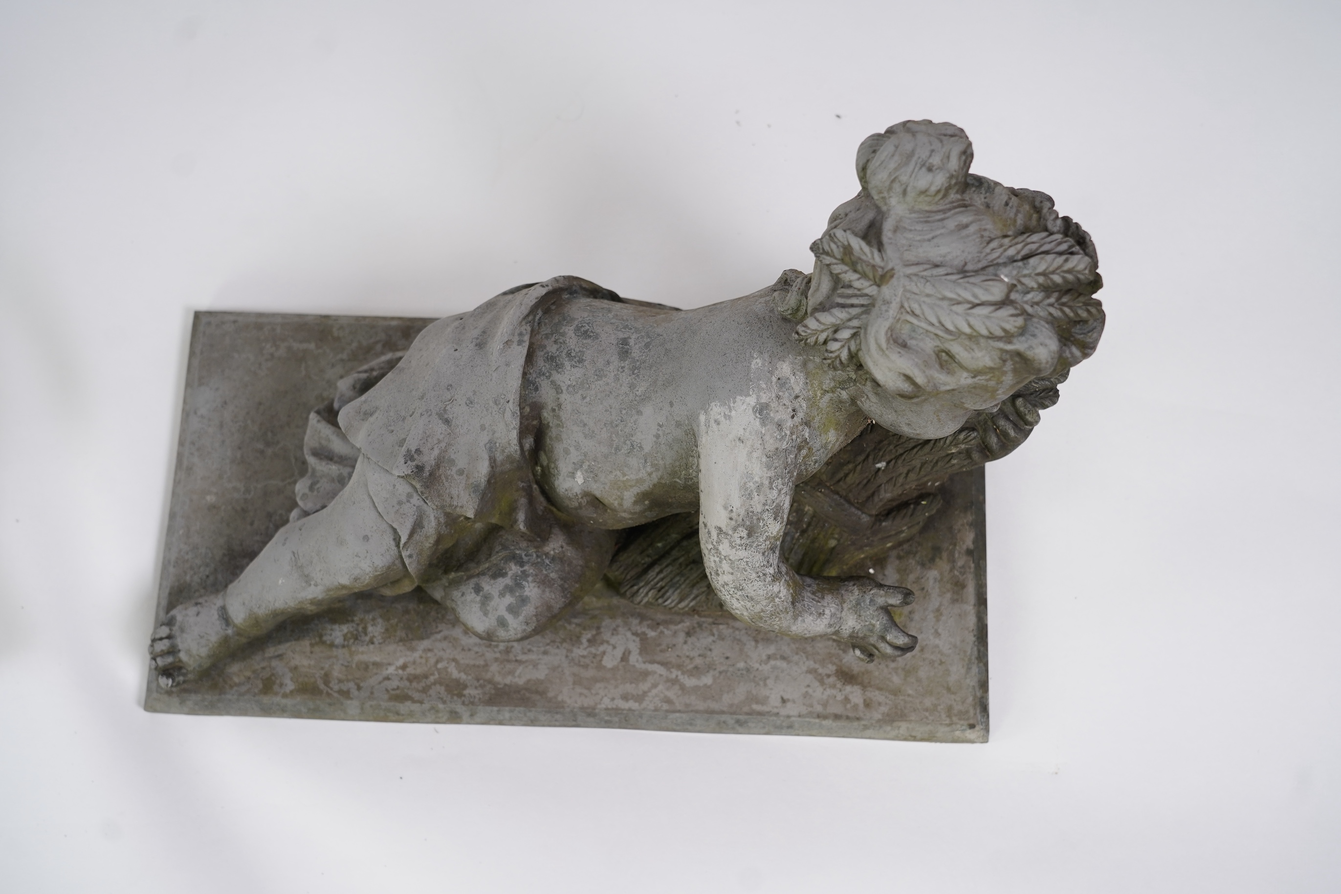 A pair of simulated lead garden sculptures, Emblematic of Summer and Autumn